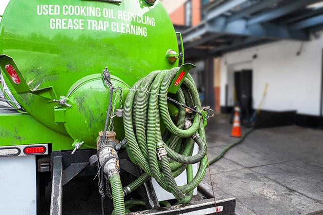 grease trap pumping truck servicing a restaurant in Central City, NE